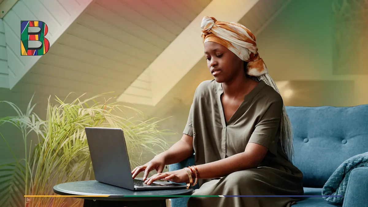 Woman applying for an online loan using a laptop at home.