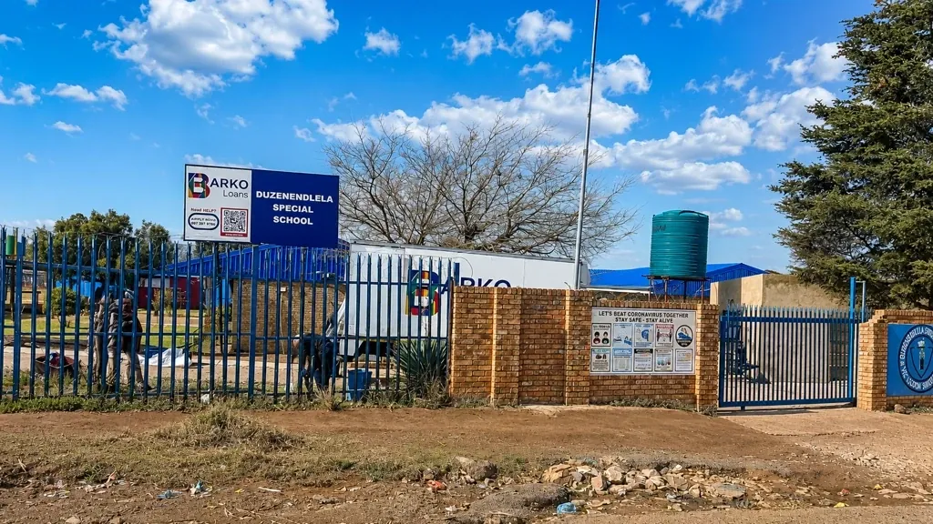 Barko Loans signage at the entrance of Duzenendlela Special School in Orange Farm.
